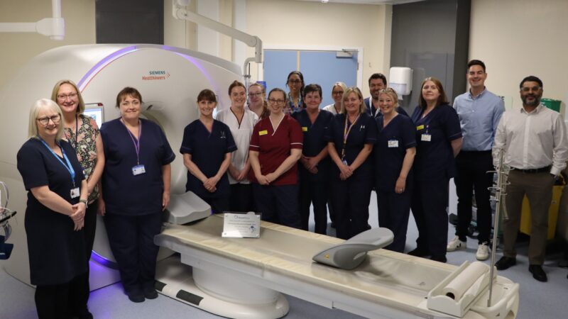 Cardiac team by CT scanner at North Tees.