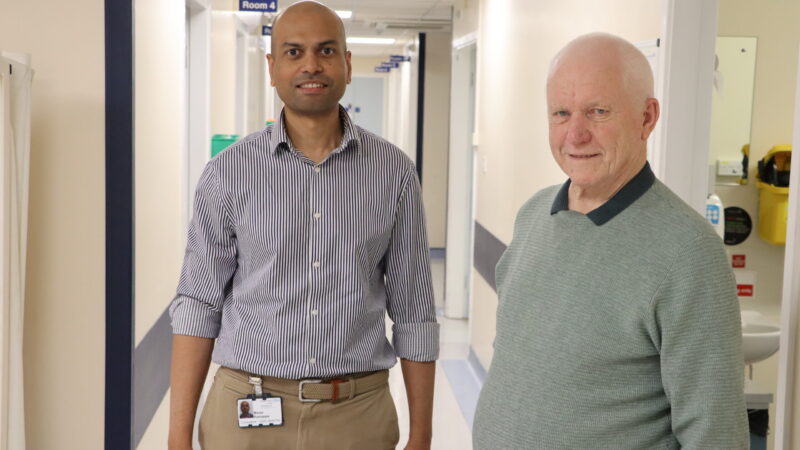 Patient with doctor who treated him stood in corridor.