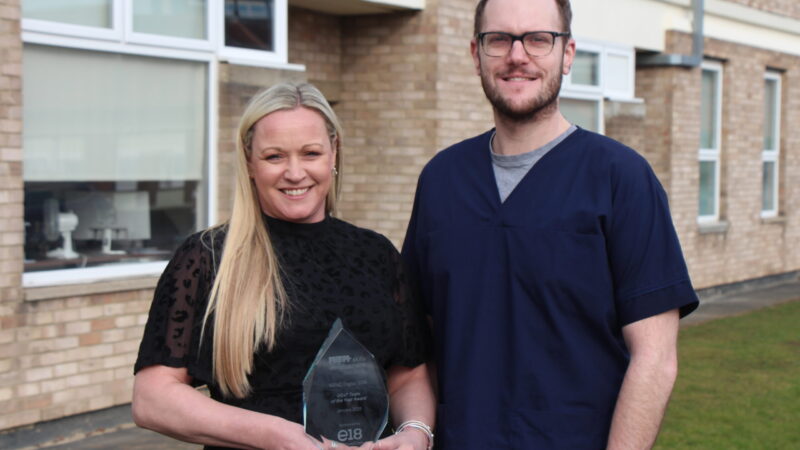 Marie Collingwood-Graham, head of digital programmes and clinical change lead Joe Telford with the Digital, Data and Technology Team of the Year award